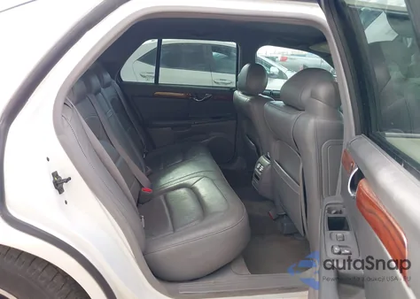 2004 Cadillac Deville Standard z USA, uszkodzony, nr VIN 1G6KD54Y44U133968